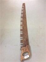 Vintage hand timber saw measuring 53 inches long