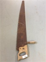 Vintage hand timber saw measuring 46 inches long