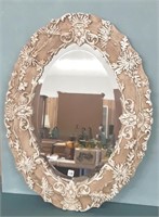 Ornate oval wall mirror