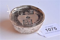 Chinese silver coloured circular ingot,