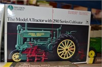 The model A tractor with 290 series cultivator