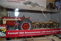 Farmall 560 demonstrator w/ gold 5-bottom plow