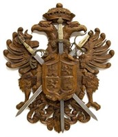 FOUR SPAIN SWORDS MOUNTED ON WOOD COAT OF ARMS