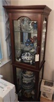 Beautiful Cherry finish two door lighted curio