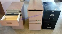 Three Metal filing cabinets