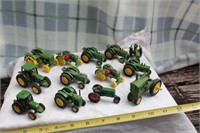 Group of Small John Deere Tractor Toys