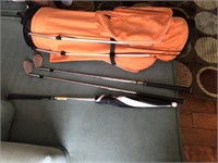 4pcs, Ping golf bag, umbrella, & 2 irons