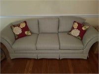 Comfortable living room couch with 2 pillows