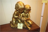 BOY AND GIRL STATUE