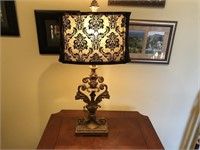 Ornate gold table lamp with shade