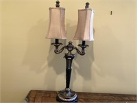 Very ornate double candle style entry lamp