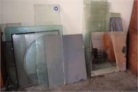 GROUPING VARIOUS SIZED AND SHAPED CUT GLASS