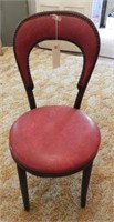 Vintage red vinyl upholstered ladies side chair