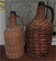 (2) primitive demijohn whiskey/rum bottles in
