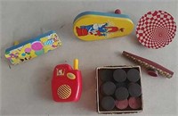 Vintage noise makers and wooden checkers