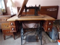 ANTIQUE TREADLE SEWING MACHINE WITH CABINET