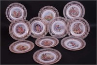 11 reticulated porcelain plates, 9" diameter,