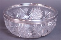 An American Brilliant cut glass bowl with a silver