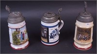 Three porcelain tankards with pewter lids
