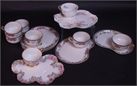 Eight Haviland china tea and toast sets;