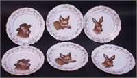 Six porcelain plates marked Haviland, 9"