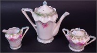 A three-piece RS Prussia coffee set decorated