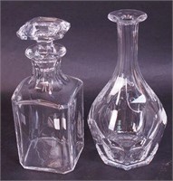 A crystal decanter marked Baccarat with no