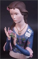 Porcelain figure of girl with roses, marked