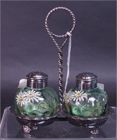 A silverplate salt and pepper holder with green