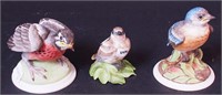 Three non-matching porcelain birds marked Boehm