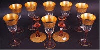 Eight pink-stemmed clear bowled goblets with