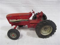 Red iron toy International tractor