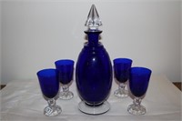 Blue Decanter with four blue glasses
