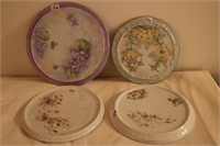Four decorative tea tiles