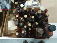 Lot of brown medicine bottles