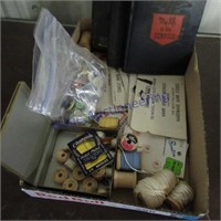 Wood bobbins, buttons, hand sewing needles,