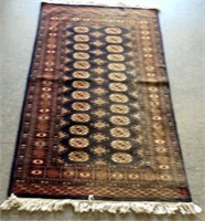 Small Persian blue ground wool floor rug