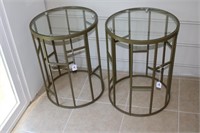 2 round glass top tables