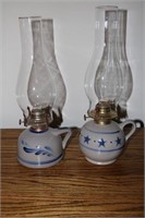 Two stoneware kerosene lamps