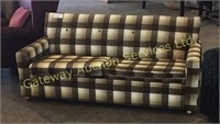 Brown/white hideabed couch