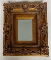 Small, Ornately-Framed Mirror with Beveled Glass