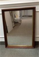 Mirror in a Walnut and Gilt Frame
