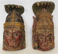 Two Indian Carved & Polychrome Wooden Temple Heads