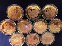10 HISTORIC EVENT COINS IN PLASTIC