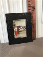 Wood framed black mirror