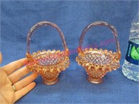 2 small pink glass baskets - 6 inch tall