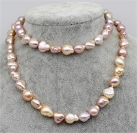 Matinee length pink baroque pearl necklace