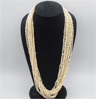14 strand rice pearl opera length necklace