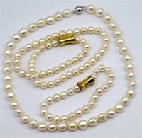 Group of two pearl necklaces and a bracelet