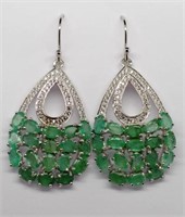 A pair of emerald and silver earrings on 9ct hooks